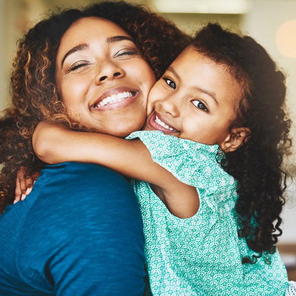 mother and daughter hugging